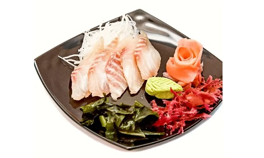 Fresh bass sashimi with garnishes at Sushi Infinity, a Japanese Restaurant in Halifax