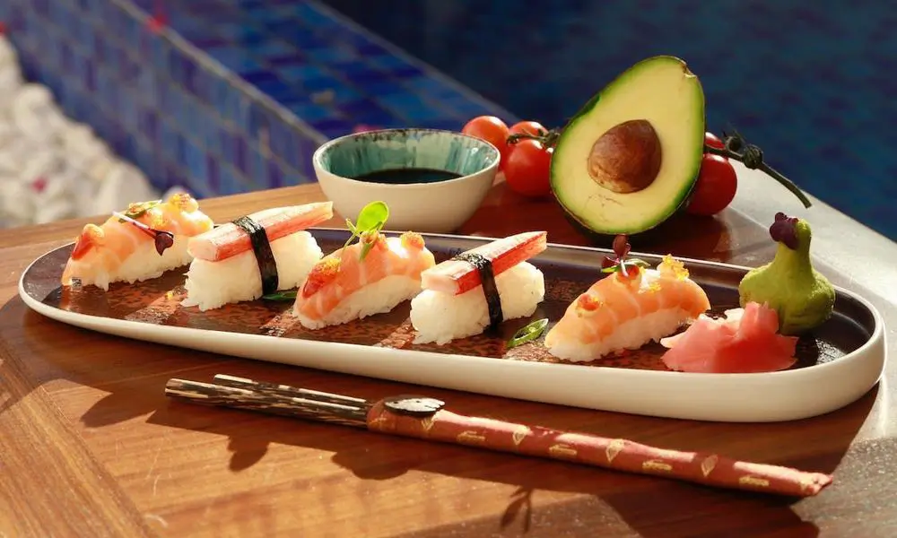 Salmon and crab stick nigiri sushi with soy sauce at Sushi Infinity, a Japanese Restaurant in Halifax